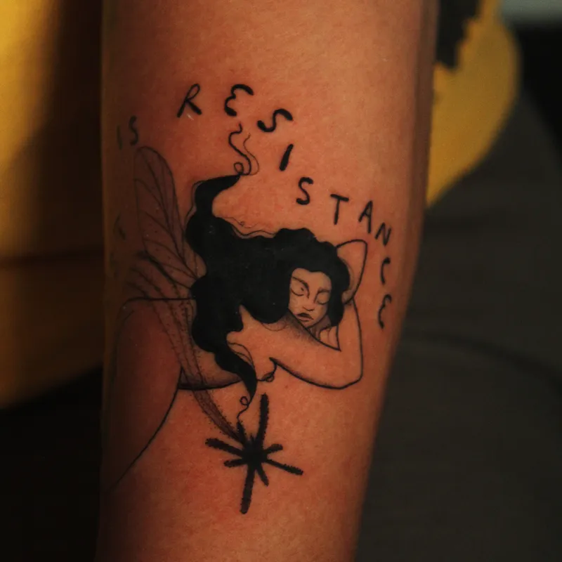 Micro fine-line botanical stem tattoo